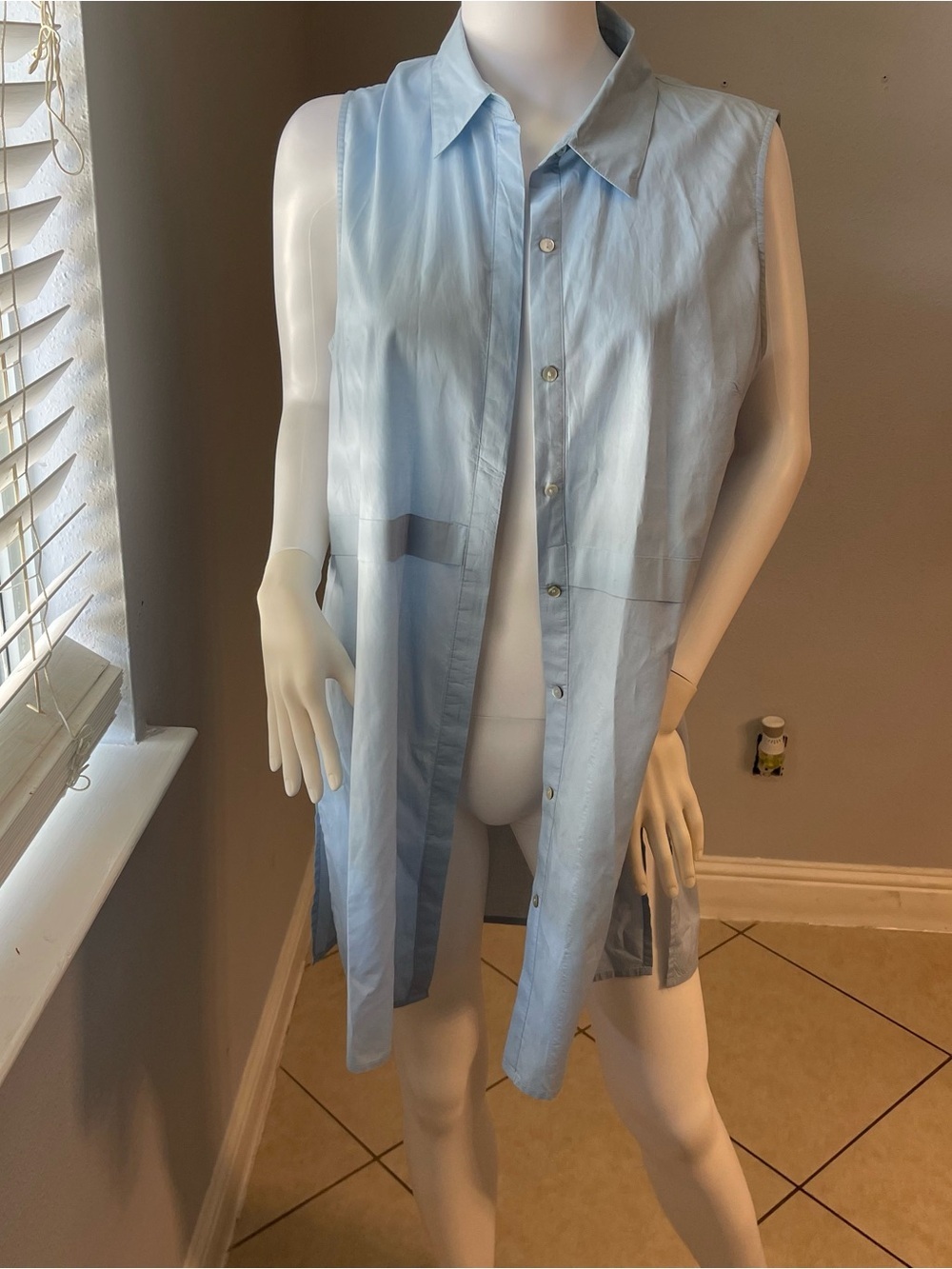 This is a light blue Forever 21 sleeveless top size medium
Like new condition - Picture 10 of 11